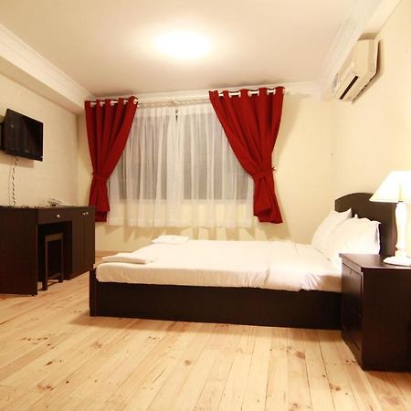 Koniko Backpackers Hostel Хошимін Номер фото
