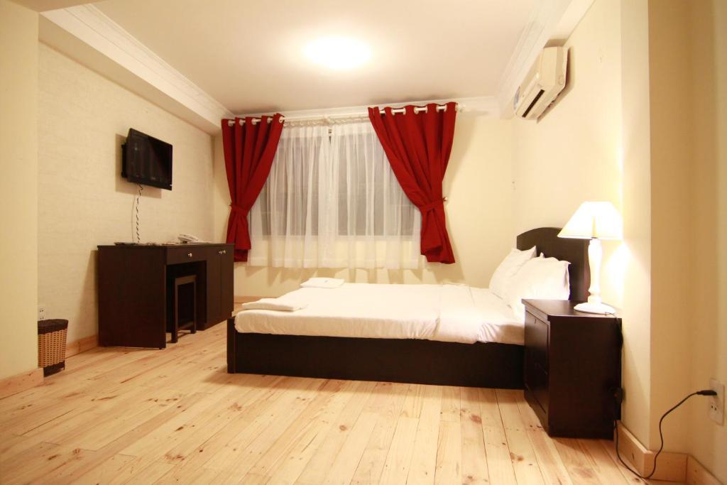 Koniko Backpackers Hostel Хошимін Номер фото
